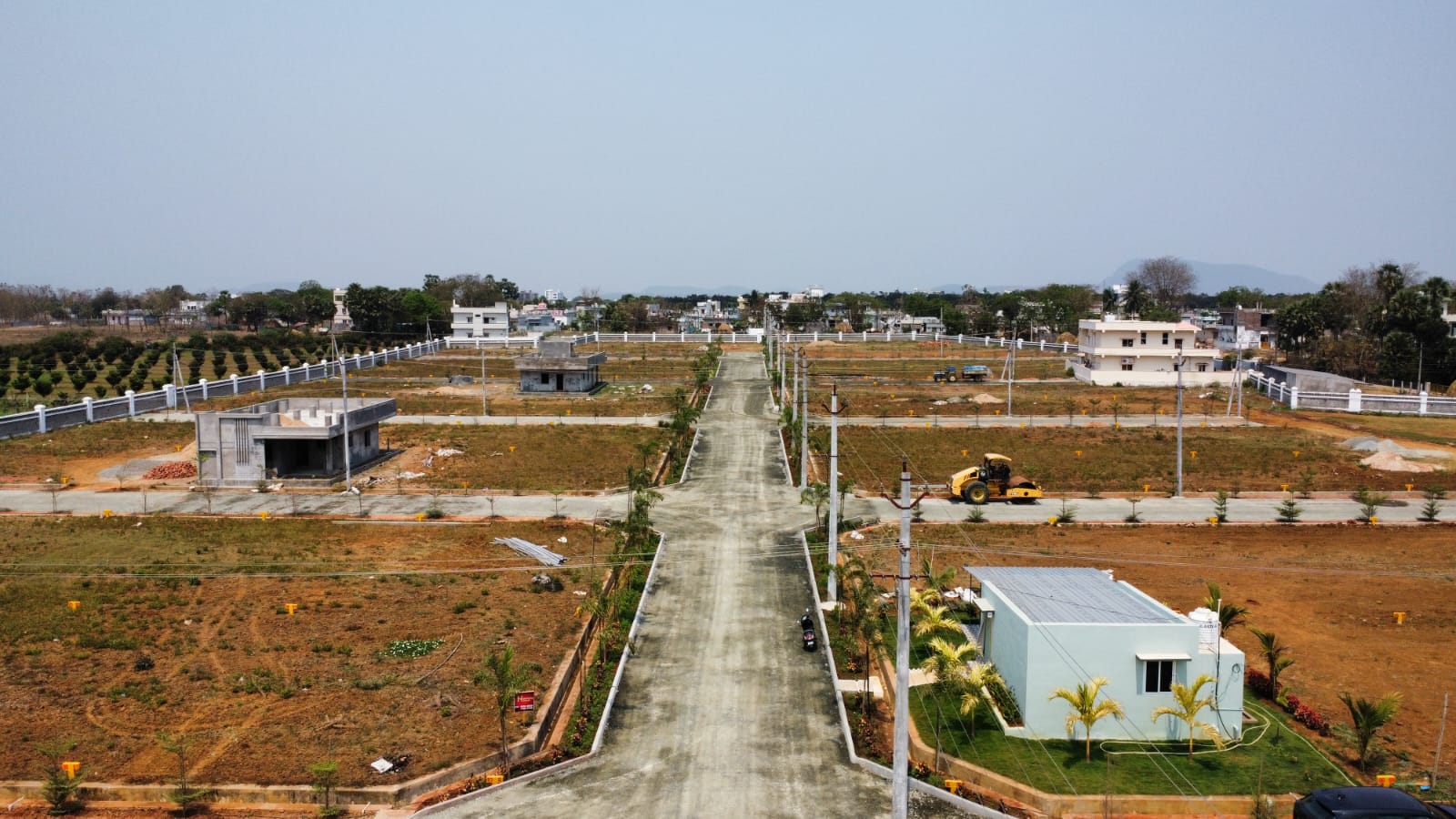Central road through developed plotted venture